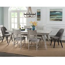 Around the table is a set of matching dining chairs. Intercon Modern Rustic Contemporary 7 Piece Table And Chair Set Fisher Home Furnishings Dining 7 Or More Piece Sets
