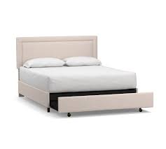 elliot square footboard upholstered storage bed pottery barn in 2020 upholstered beds upholstered footboard upholstered headboard