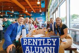 For twins Steve '12 and Don '12 Hopkins (pictured with Waltham Fire Chief Randy  Mullin '96), the firefighter commitment to community is as strong as their  brotherly bond. While they were three-sport