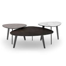 Top view empty white ceramic cup of traditional vietnamese coffee on wooden table. Pebble Ceramic Coffee Table 5 Finishes Available 4 Sizes