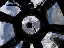 View Of Earth Through The Cupola On The International Space Station Photographic Print Stocktrek Images Art Com Space Station International Space Station Nasa Images