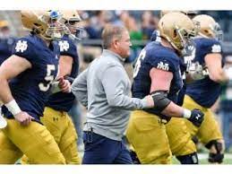 The Jog For The Notre Dame Team Taking The Field Is Always A Great Site To See And Definitely College Football Picks Nfl Football Picks College Football Season