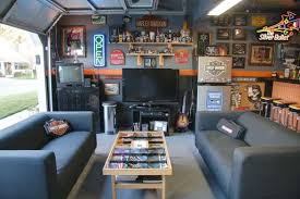20 Cool Living Spaces Inside Of Garages Man Cave Garage Garage Game Rooms Man Cave Home Bar