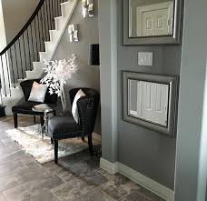 Modern Glam Foyer Black White Silver Grey Spiral Staircase Mirrors White Rugs Sitting Area My Home Foyer Ideas Entryway Foyer Decorating Living Room Decor