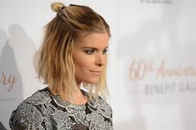 The half bun is the sort of magical hairstyle achieved from indecision: Hair Up The Half Bun Vogue It