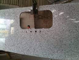 While flamed granite is a popular choice for indoors, it is very often used in outdoor kitchens because the distressed finish holds up well against the elements. Chinese Granite Bala White Granite Countertops In Polished Honed Flamed China Granite Countertop Granite Slab