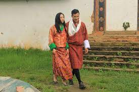It is a large, rectangular textile that is wrapped around the body, folded into a wide pleat in front, and fastened at the shoulders with ornate silver and gold brooches. Bhutan Woman S Traditional Dress How To Wear See Video