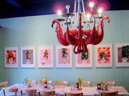 The Side Room With Flamingo Chandelier At Cafe Hon Francine Halvorsen Flamingo Decor Flamingo Theme Camper Decor