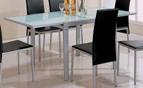 The table can be made with or without an extension. Amazon Com Sunrise Frosted Glass Dining Table With Metal Extensions Home Kitchen