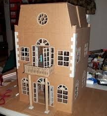 عمل جراج سيارات وبيت الدمى من الكرتون للاطفال بالصور Diy Dollhouse Barbie Doll House Cardboard Dollhouse