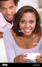 Friends play video games hi-res stock photography and images