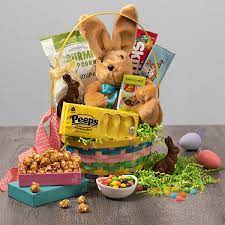 Easter baskets are typically filled with easter eggs, food, toys, or other gifts depending on one's culture. Classic Easter Bunny Gift Basket By Gourmetgiftbaskets Com