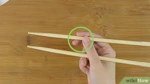 *holding** the chopsticks is only part of the problem; 3 Ways To Eat Rice With Chopsticks Wikihow