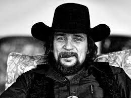 Did John ever do any “Cowboy” themed songs?