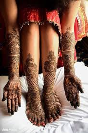 The Mehndi Party Takes Place Bridal Mehendi Designs Indian Wedding Photography Mehendi Photography