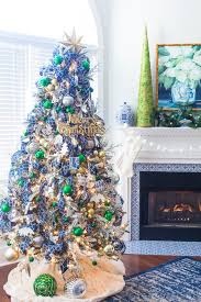 White and light blue color tones lighten up green branches and create a pleasant feel inspired by fresh snow. Blue And Green Christmas Tree Christmas Tree Ideas 2 Bees In A Pod
