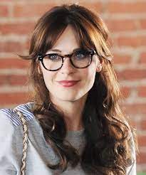 The 24 Most Iconic Bangs Ever Ranked Long Hair With Bangs Zooey Deschanel Hair Hairstyles With Glasses