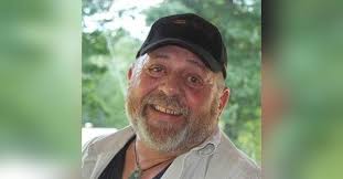 John W. Stoops Obituary