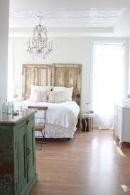 Both the headboard and footboard are accented. Cozy And Contemporary Wood And White Bedrooms To Fall In Love With