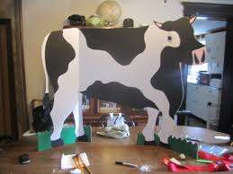 Lesson I Did About Cows And Their Milk The Cow Was Made From A Tri Fold Board Paint One Googly Eye A Bell And Rubb Farm Theme Farm Preschool Animal Crafts