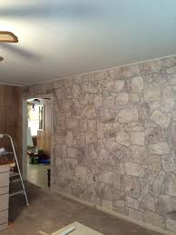 This Is Over Paneling I Fill The Grooves Paint The Basecoat Then Hand Tear Hand Paint And Install The Rocks Lik Faux Rock Walls Stone Panels Rock Panel