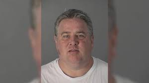 Trinity man accused of impersonating police officer at Dunkin' Donuts