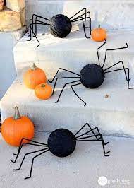 Giant spiders are taking over homes for halloween—the fake ones, at least. 75 Easy Diy Halloween Decorations Cheap Halloween Decor Ideas
