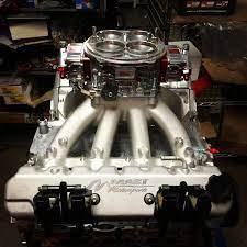 ls7 427 carbureted with a quickfuel 1050 carb 727 hp engineering car maintenance race engines