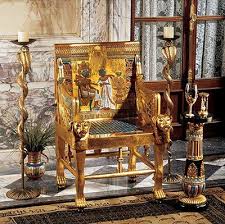 Egyptian Chair Heavily Encrusted With A Gold Finish The Chair Legs Have A Carving Of Feet Lions Feet Egyptian Home Decor Egyptian Furniture Throne Chair