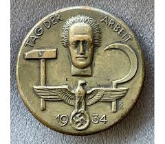 Very nice 'tag der arbeit 1934' badge in good condition. Tag Der Arbeit 1934 Badge