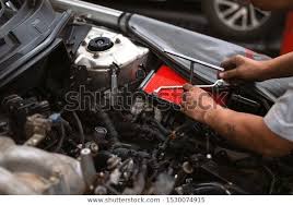 Mechanic Working Car Maintenance Softfocus Over Stock Photo Edit Now 1530074915