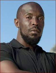 By getting slashed across the face with a razor in a bar fight on his 25th birthday. Scar Scar Story Michael K Williams Michael K Williams Kenneth Williams Williams