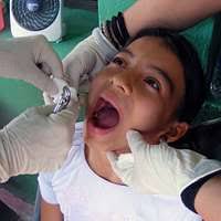 Capt. Roland McCoy, a dentist assigned to Commander,