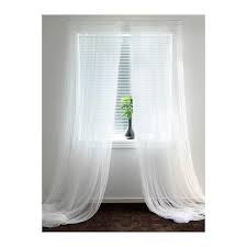 Sheer Window Panels 13 Ways To Bring Beachside Style Into Your Home White Curtains White Paneling White Sheer Curtains