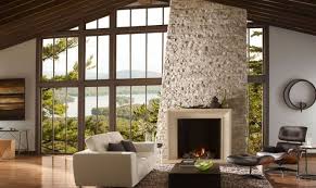 The stacked stone ledgers are strips of dark, charcoal marble glued to interlocking panels for easy installation. Photos Of Veneer Stone Fireplace Surrounds