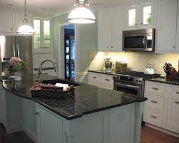 The shimmering speckles of uba. Uba Tuba Granite White Cabinets Www Stkittsvilla Com Replacing Kitchen Countertops Kitchen Cabinet Design Kitchen Remodel