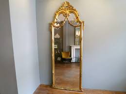 One of the oldest tricks in the book to make a room (especially tight bedrooms) appear larger is with the use of wall mirrors, but it's important not to sacrifice your unique interior design flair.luckily we have an array of designer vintage mirrors in a range of antique and modern designs that are sure to reflect not only your space, but. Antique French Gold Gilt Floor Standing Mirror At 1stdibs