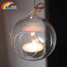 You should purchase a glass candle, votives, or a glass candle holder that can illuminate the these can be hung from the ceiling to light up the sky or down below to add a glow to her toes! Family Garden Wedding Party Decorated Transparent T Light Hanging Ball Shape Clear Glass Candle Holder Buy Glass Candle Holder Clear Glass Candle Holder Hanging Glass Ball Candle Holder Product On Alibaba Com