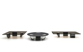 It also features a lower shelf that is perfect for your favorite magazines. Wedge Coffee Tables En
