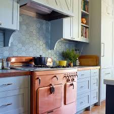 Find modern kitchen backsplash mosaic tile ideas & designs for counter, stove, countertop with glass in metal, black and white. This Hot Kitchen Backsplash Trend Is Cooling Off
