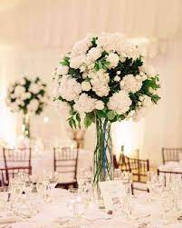 Innogear artificial flowers, 50 pcs faux flowers fake flowers white roses perfect for diy wedding bouquets centerpieces bridal shower party home flower arrangement decorations. 32 Classic Wedding Centerpieces We Love Flower Centerpieces Wedding Wedding Flower Arrangements Classic Wedding Centerpieces