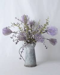 You can put artificial flowers in water if they are put in a glass vase. Artificial Flower 33 33 40cm Wild Flower In Metal Pot Gs 03319264 Silk Flowers Factory Artificial Tree Manufacturer Wholesaler China