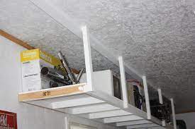 Overhead storage is a great way to maximize your space and store. Overhead Garage Storage Diy How To Build Garage Storage Ideas