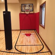 Turning A Small Space Into Usable Space Chicago Bulls Mini Court Home Basketball Court Basketball Room Basement Design