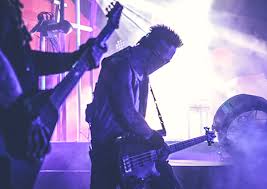 Bass player for in this moment. Travis Johnson In This Moment
