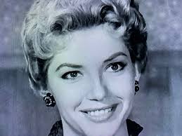 Angie Dickinson compares 'beautiful men' to doughnuts (donut American sp).  Here was me waiting for her to mention DJ and she didn't. I wonder what  kind of doughnut he would have been?