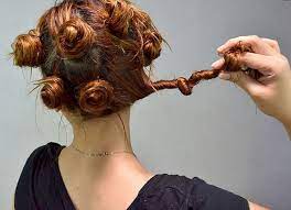 The trick to making this bun appear stunning is to separate the hair on the sides into strands and give them a little twist before allowing them to join the ponytail. 9 Heatless Ways To Curl Your Hair Minq Com