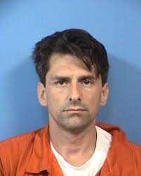 Man accused of pretending to be a cop in Lombard gas station dispute