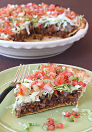 Tear 5 corn tortillas and line them on the bottom of the pie dish. Loaded Taco Pie Recipe An Easy Dinner Recipe Mantitlement