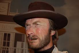 With his cigar in his mouth, whether it was his man with no name in leone's films or the stranger in his own high plains drifter, eastwood was a taciturn loner not looking for trouble. Wax Statue Of Clint Eastwood Editorial Photography Image Of Cigar Celebrity 19064222